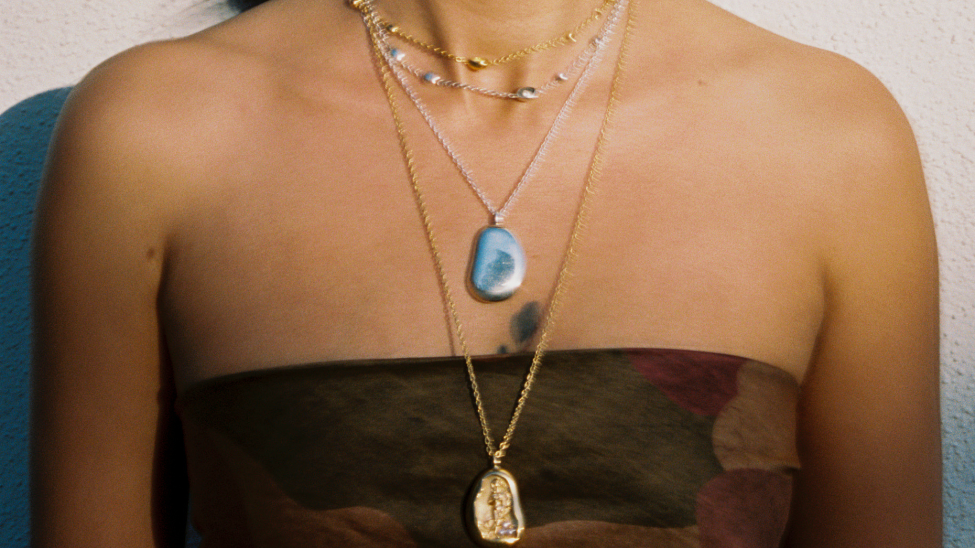 How to layer necklaces without tangle or tension.
