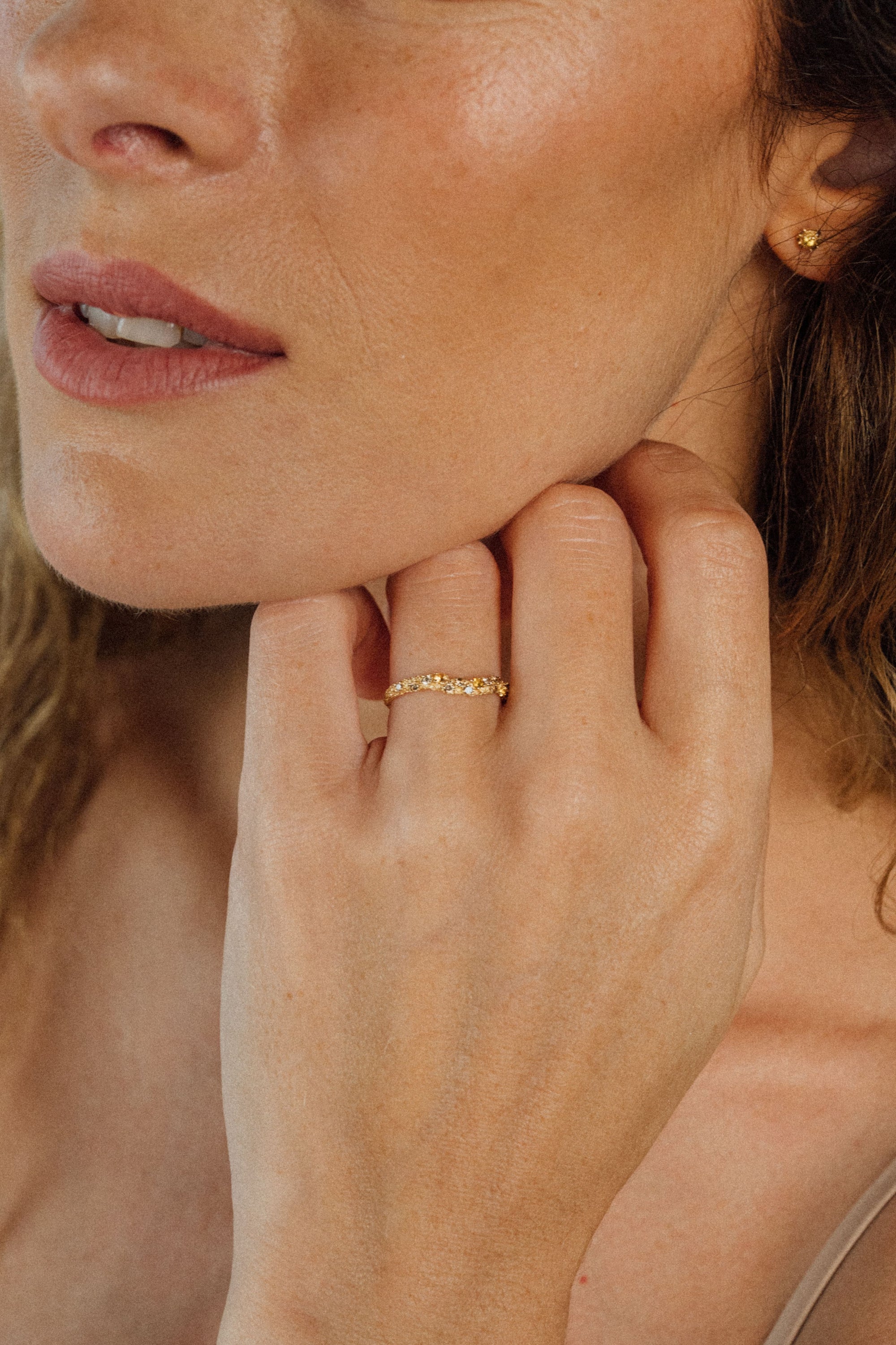 Recycled 18K yellow gold band ring with a soft crest and pavé-set brown diamonds and yellow sapphires. Handcrafted in Bali with stones set in Bangkok.